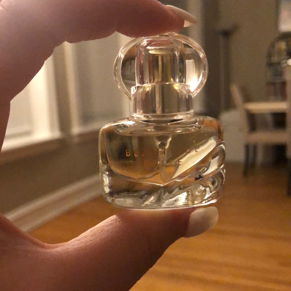 Estee lauder mini travel size perfume ( beautiful belle)